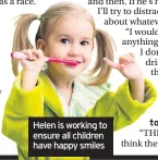  ??  ?? Helen is working to ensure all children have happy smiles