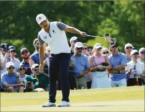  ?? Sam Greenwood / Getty Images ?? K.H. Lee reacts to his putt on the 18th green during the final round of the AT&T Byron Nelson on Sunday in McKinney, Texas.