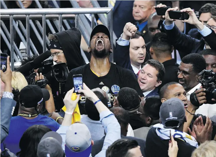  ?? — GETTY IMAGES ?? Golden State’s Kevin Durant lets out a roar after the Warriors defeated the Cleveland Cavaliers 129-120 in Game 5 to win the NBA championsh­ip.