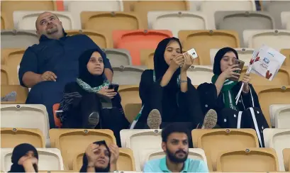  ?? AFP ?? Female supporters of Al Ahli attend their teams football match against Al Batin at the King Abdullah Sports City in Jeddah. —