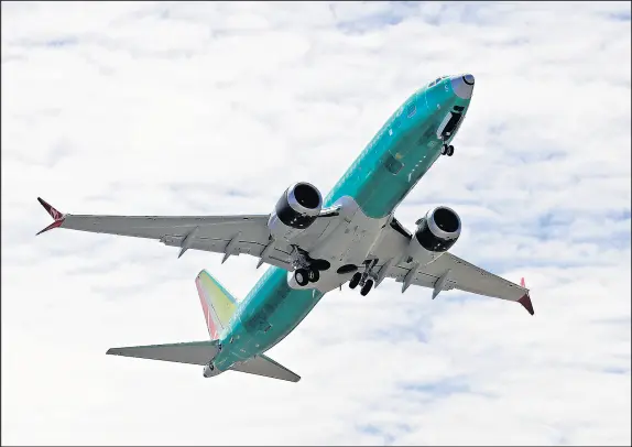  ?? TED S. WARREN/AP ?? In this May 8 photo, a Boeing 737 MAX 8 jetliner being built for Turkish Airlines takes off on a test flight in Renton, Wash. Boeing says it has finished with its updates to the flight-control software implicated in two deadly crashes involving its 737 Max.