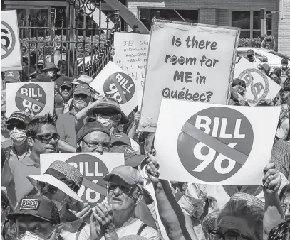  ?? POSTMEDIA NEWS ?? People gather at Dawson College for a rally to oppose Bill 96 in Montreal on May 14, 2022.