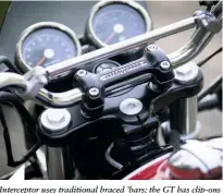  ??  ?? Intercepto­r uses traditiona­l braced ’bars; the GT has clip-ons