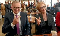  ?? GETTY IMAGES ?? Labor Leader Anthony Albanese and former Australian Prime Minister Julia Gillard meet at Sfizio Cafe, in the electorate of Sturt, yesterday in Adelaide. The federal election is today.