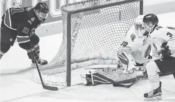  ?? BRANDON HARDER ?? Nick Henry, left, and the Regina Pats play host to the Moose Jaw Warriors on Saturday before welcoming in the Everett Silvertips on Sunday. The team has gone 0-5-0 at the Brandt Centre this season.