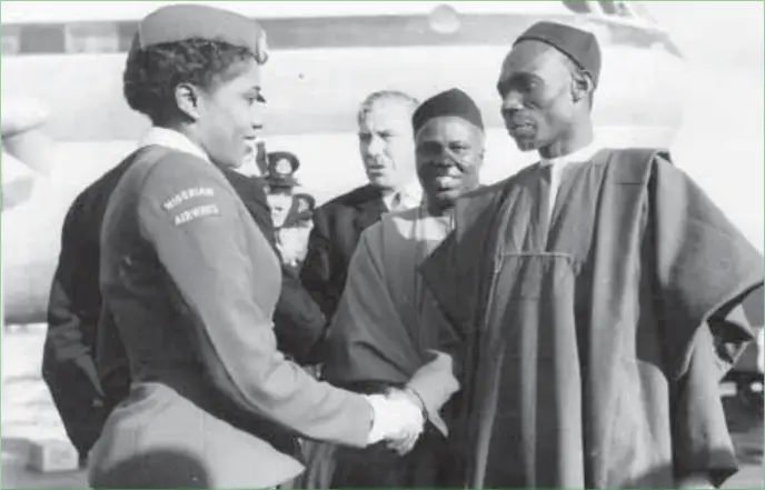  ??  ?? The first Nigerian prime minister, Abubakar Tafawa Balewa, greets an air stewardess after the inaugural flight of the WAAC (West African Airline Company) on Oct 1, 1958. (Keystone/Getty Images