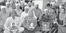  ?? SAMEER SEHGAL/ HT ?? The family members of victims of the train tragedy during a prayer meeting organised by the BJP in Amritsar on Saturday.