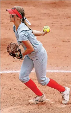  ?? [PHOTO BY STEVE SISNEY, THE OKLAHOMAN] ?? Lyndie Ervin of Washington pitches in first-round game Friday against Prague at the state fastpitch softball tournament at Hall of Fame Stadium.