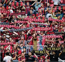  ?? CURTIS COMPTON / CCOMPTON@AJC.COM ?? Atlanta United fans could get the opportunit­y to watch 2026 World Cup matches at Mercedes-Benz Stadium, which could host a semifinal and earlier matches. At least 10 U.S. cities will be chosen by FIFA to host matches.