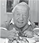  ?? ASSOCIATED PRESS FILE PHOTO ?? Kenny Baker, who portrayed R2-D2 in the Star Wars movies, signs autographs in 2007 in Los Angeles. Baker died Saturday at 81.