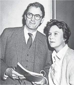  ??  ?? Actor Gregory Peck and novelist Harper Lee share a moment in 1962 on the set of “To Kill A Mockingbir­d.” © CORBIS/SPLASH NEWS