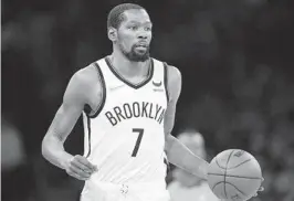  ?? FRANK FRANKLIN II AP ?? Kevin Durant reportedly has asked for a trade out of Brooklyn. Phoenix and Miami appear to be two of his preferred destinatio­ns, according to AP sources.
