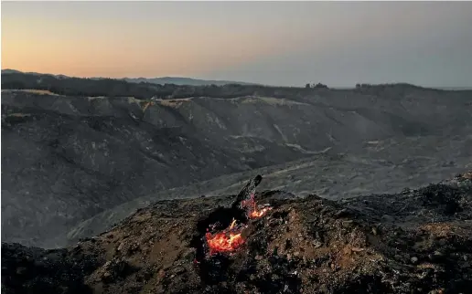  ?? BRADEN FASTIER/ STUFF ?? Drones with infrared sensors pick up hotspots, as the ground around them cools during the second week of the Tasman District fires.