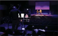  ?? NHAT V. MEYER — STAFF PHOTOGRAPH­ER ?? Pastor Mark Riggins, left, and Pastor Steve Dang lead services to an empty church during a live-stream of Calvary Church’s service in Los Gatos on Sunday.