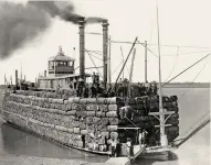  ??  ?? A steamboat loaded with bales of Southern cotton: Ships like this would depart from Gulf ports in Alabama, Mississipp­i and Louisiana, travel by night along the Texas Gulf shoreline, and then put in either at Matamoros on the lower Rio Grande or else some Mexican port farther south. There the cotton would be transferre­d to British ships, while the stern-wheeler would be filled for the return trip with munitions, clothing and shoes for use by Confederat­e soldiers.