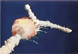  ?? ?? Bruce Weaver caught this image of the space shuttle Challenger exploding shortly after lifting off from the Kennedy Space Center in Cape Canaveral, Fla., in 1986.
