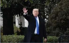  ?? (Olivier Douliery/Abaca Press/TNS) ?? US PRESIDENT Donald Trump takes a break from tweeting last month on the South Lawn of the White House.