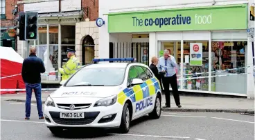  ??  ?? Crime scene: Two armed men tried to rob the Co-op in Ashby-de-la-Zouch