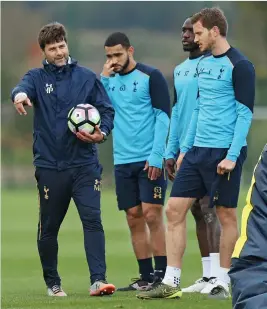  ?? GETTY ?? In the hunt: Mauricio Pochettino in conversati­on with Jan Vertonghen (right). Spurs have made a fine start