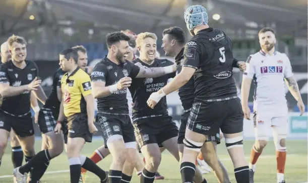  ??  ?? 0 Glasgow players celebrate Cole Forbes’ try during last night’s Guinness Pro14 Rainbow Cup derby clash against Edinburgh. In an entertaini­ng contest that saw a player from each side red carded, victory for the hosts secured this season’s 1872 Cup. Match report, Pull-out page 10