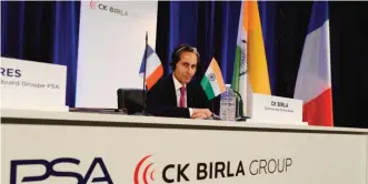  ?? — AFP ?? PARIS: CK Birla, chairperso­n of Indian conglomera­te CK Birla Group, attends a press conference at the Groupe PSA headquarte­rs.