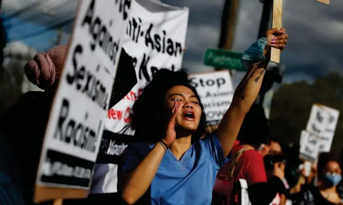  ?? Photograph: Shannon Stapleton/Reuters ?? A demonstrat­ion in Atlanta on Thursday against racism and sexism following the shootings on Tuesday.