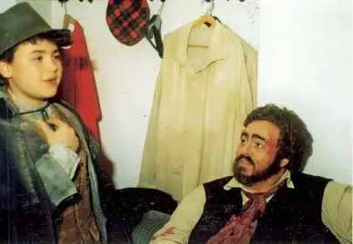  ??  ?? Above A 13-yearold Vittorio Grigòlo backstage with the great tenor Luciano Pavarotti, during the production of Tosca at Teatro dell’opera di Roma