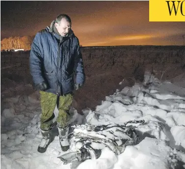  ?? VASILY MAXIMOV / AFP / GETTY IMAGES ?? There were questions about whether the An-148 passenger plane had been properly de-iced after it crashed Sunday, just minutes after taking off from Domodedovo Airport on the outskirts of Moscow.