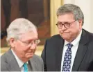  ?? PATRICK SEMANSKY/AP ?? Attorney General William Barr, right, walks past Senate Majority Leader Mitch McConnell of Kentucky on Wednesday.