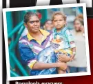  ?? Picture: GLENN CAMPBELL ?? Borroloola evacuess Kimberley Peter and her son Isiah, 2, in Darwin yesterday