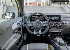  ??  ?? Both the A 45 and CLA 45 get Mercedes’ latest big twin-screen dash and MBUX infotainme­nt system.