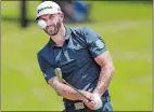  ?? JIM WEBER/THE COMMERCIAL APPEAL/AP PHOTO ?? Dustin Johnson chips onto the fifth green during final round of the St. Jude Classic on Sunday at Memphis, Tenn.