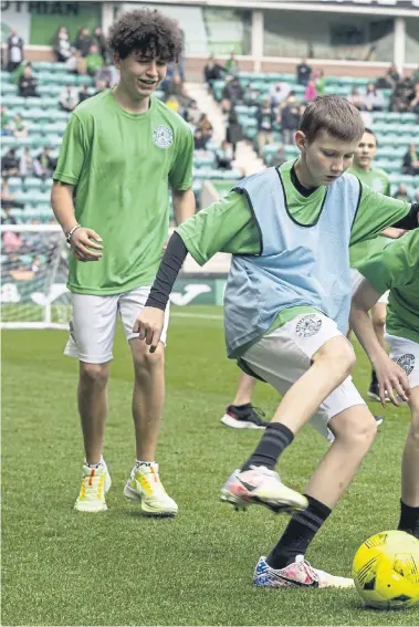  ?? Picture: Alan Rennie ?? The kids got to play on the pitch at half-time at Easter Road in May, 2022