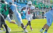  ?? JIM RASSOL/STAFF FILE PHOTO ?? Last year, Owls running back Devin Singletary ran for a school-record 1,920 yards and led the nation with 32 touchdowns.