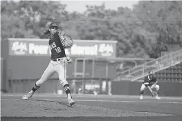  ?? Staff photo by Evan Lewis ?? Pleasant Grove senior pitcher Caleb Bolden fires a pitch in the fifth inning of a Class 4A semifinal against Abilene Wylie on Wednesday in Austin. Bolden gave up four hits in six innings, walked one and struck out nine in the Hawks’ 3-1 loss.