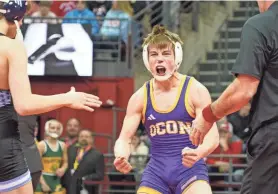  ?? ZAC BELLMAN / MILWAUKEE JOURNAL SENTINEL ?? Oconomowoc freshman Kellen Wolbert celebrates after completing an undefeated season (47-0) with a win at 120 pounds over Ben Bast of West Bend West.