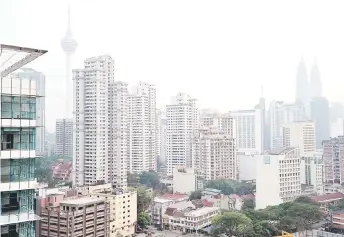  ?? — Bernama photo ?? In the short term, analysts believe that Malaysian developers could be negatively impacted by the additional tax or offering larger discounts to clear their unsold inventorie­s.