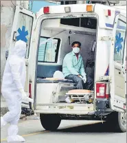  ?? PTI ?? ■
A Covid-19 patient being taken to a hospital at Fancy bazaar area in Guwahati on Friday.