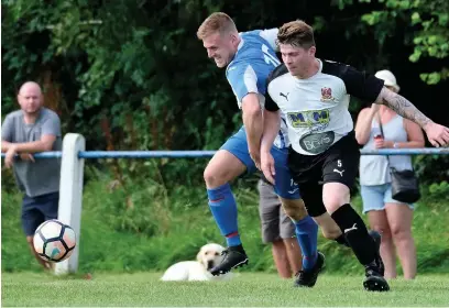  ??  ?? ● Bacup defender Ross Mallinson in action
