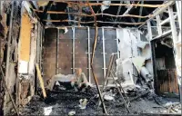  ?? PICTURE: REUTERS ?? A local resident sits in his house, which was damaged by recent shelling, in the rebel-controlled city of Donetsk, Ukraine.