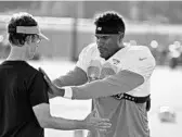  ?? WILFREDO LEE/ASSOCIATED PRESS ?? TE Julius Thomas, shown taking part in drills earlier this month, sat out Monday’s practice to rest his back.