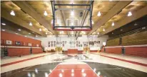  ?? ?? A newly resurfaced court and newly painted court markings are seen in the renovated Lake Station Edison gym on Tuesday.