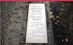  ?? — AFP ?? A new tombstone for William Blake lies on his grave at Bunhill Fields Burial Ground in London.