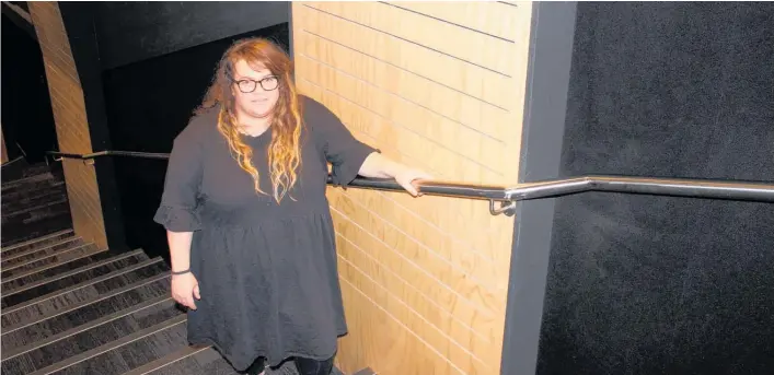  ?? Photos / David Haxton ?? Sonia Hardie holds a new handrail in the Coastlands Theatre.