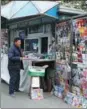  ?? WANG JING / CHINA DAILY ?? Above: A newsstand in Beijing.