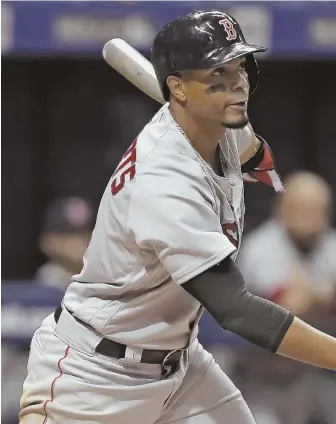  ?? AP PHOTO ?? FIRE STARTER: Xander Bogaerts went 5-for-8 with four doubles in the season’s first two games, then slammed a second-inning home run last night to open the scoring against the Rays in St. Petersburg, Fla.