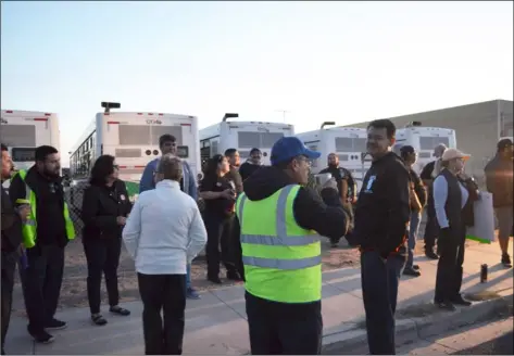  ?? PHOTO JULIO MORALES ?? First transit inc. employees gathered early tuesday morning at their ross avenue facility to announce their dissatisfa­ction with their current wage schedule and ongoing contract negotiatio­ns.