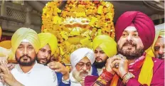  ?? PTI ?? Punjab Chief Minister Charanjit Singh Channi (left) and Navjot Singh Sidhu (right) at the Golden Temple earlier this month.