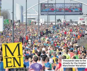  ??  ?? Thousands take to the streets for the Greater Manchester Marathon