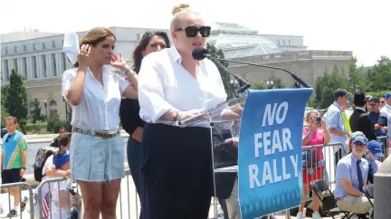  ?? (Ron Kampeas) ?? MEGHAN MCCAIN speaks at Sunday’s rally against antisemiti­sm, as Israeli actress Noa Tishby and Arizona State Rep. Alma Hernandez look on at the US Capitol in Washington.